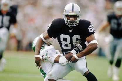 Raghib "Rocket" Ismail Signed Oakland Raiders Jersey (Beckett) Ex Notre Dame W.R